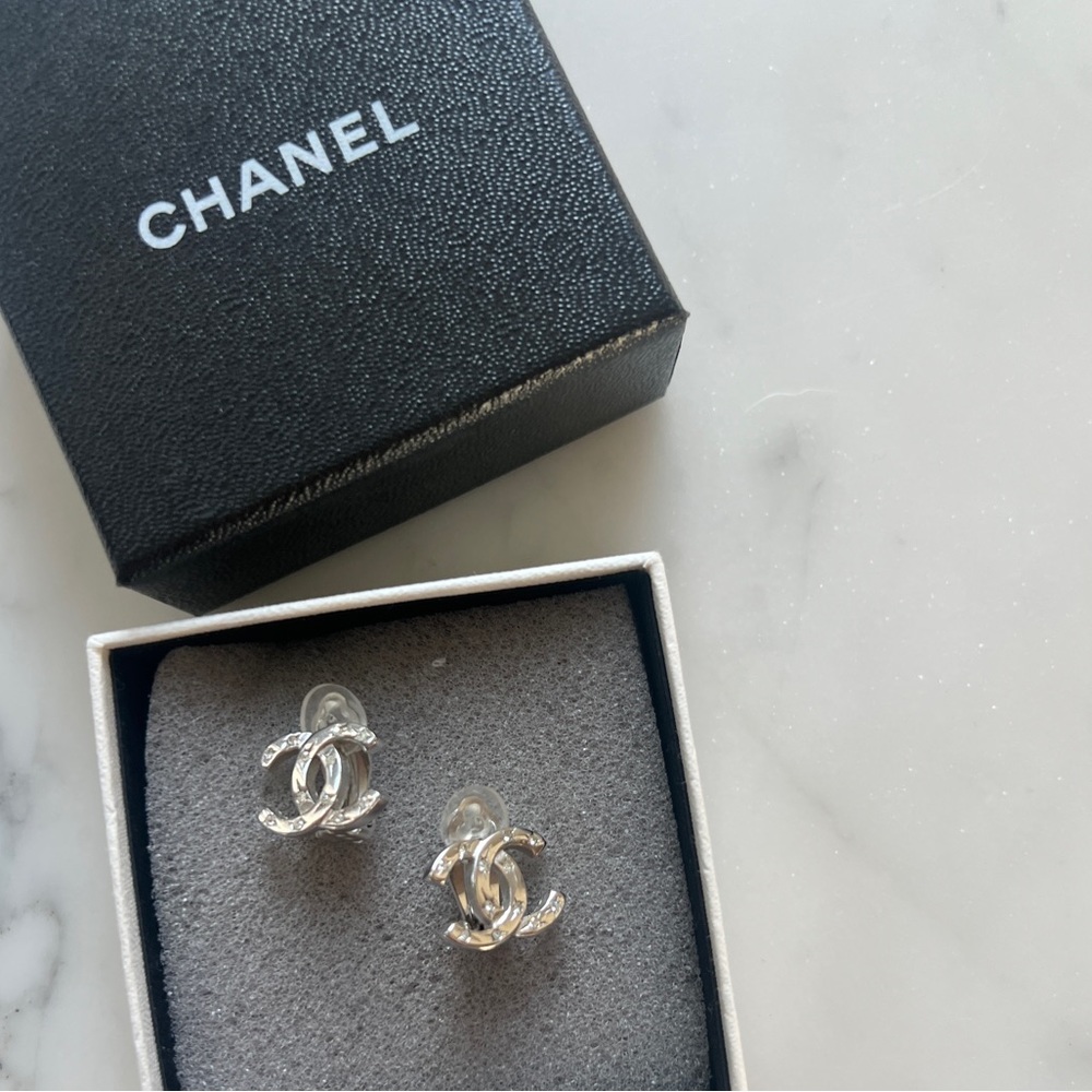Chanel CC silver rhinestone clip on earring